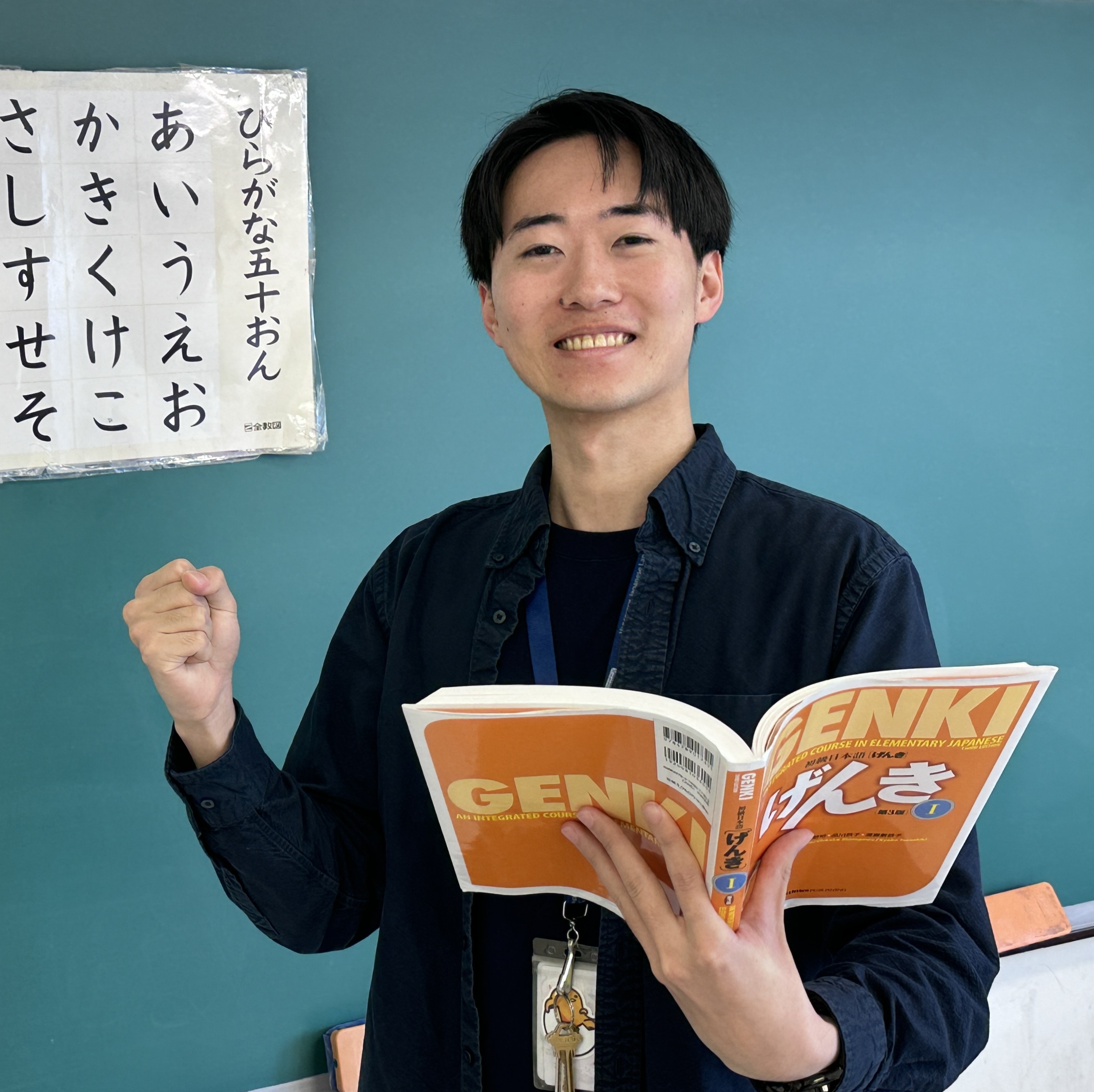 Japanese teacher with Genki textbook